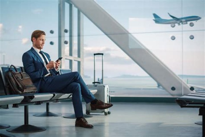 Can spouses go on business trips?