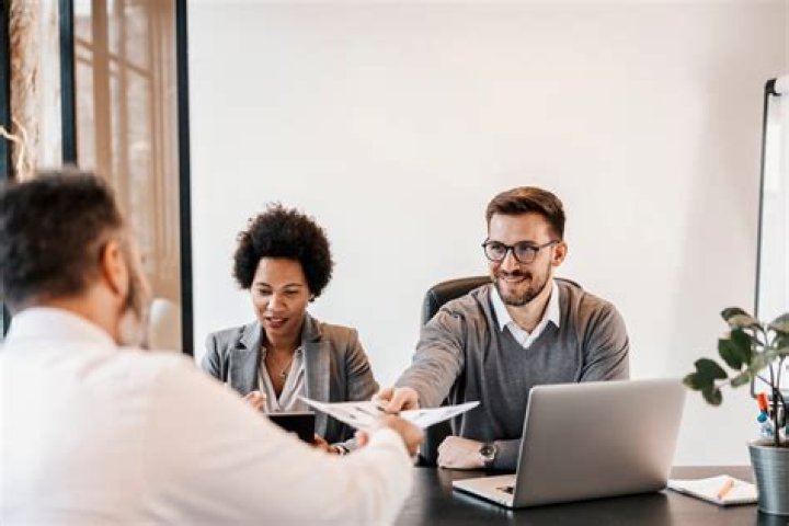 What is it called when you hire someone from another company?