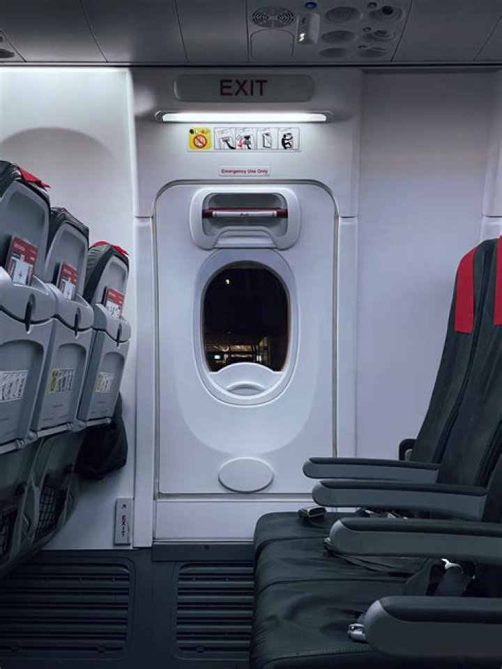 What type of passengers Cannot be seated in an emergency exit row?